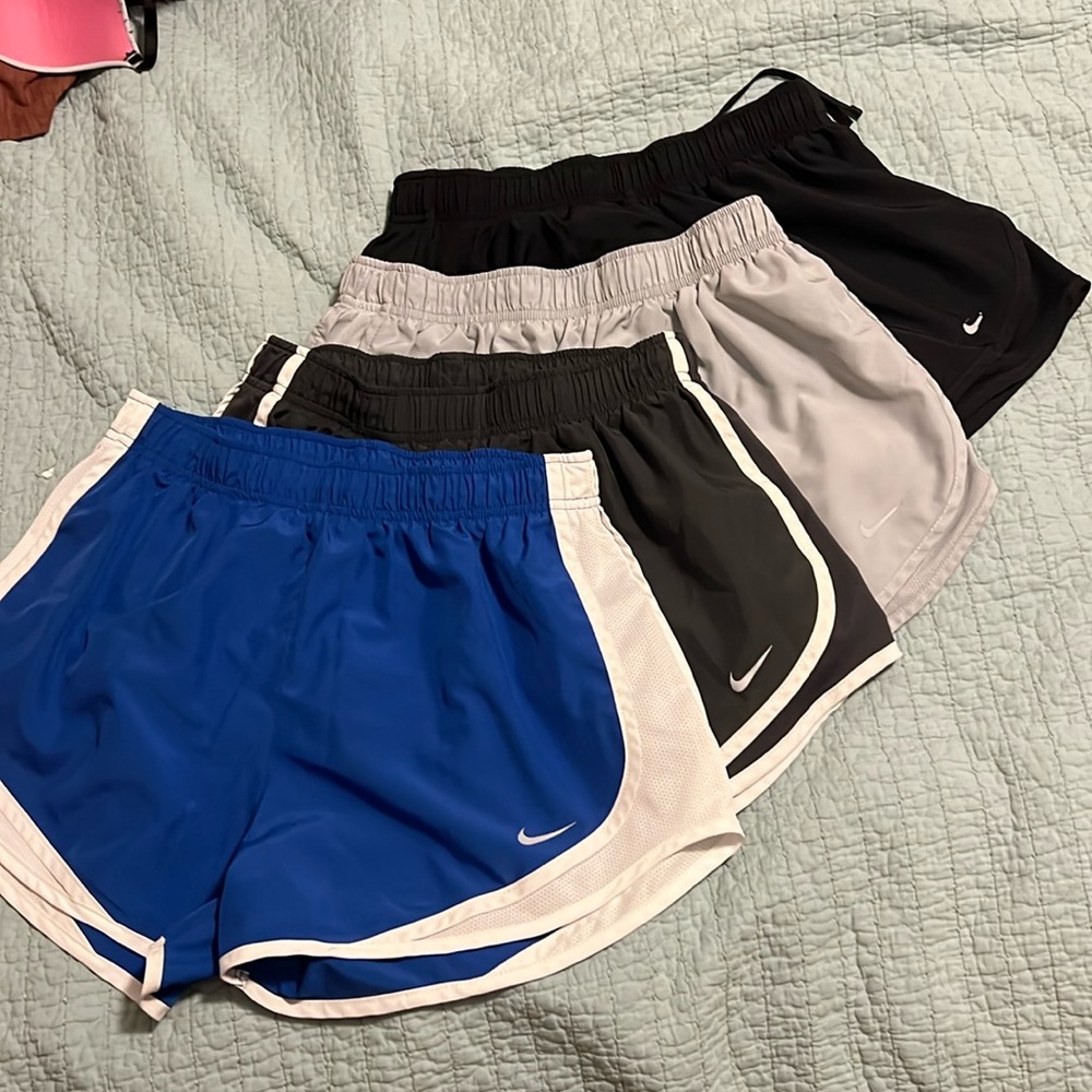 4 pairs of Nike tempo Dri-Fit shorts